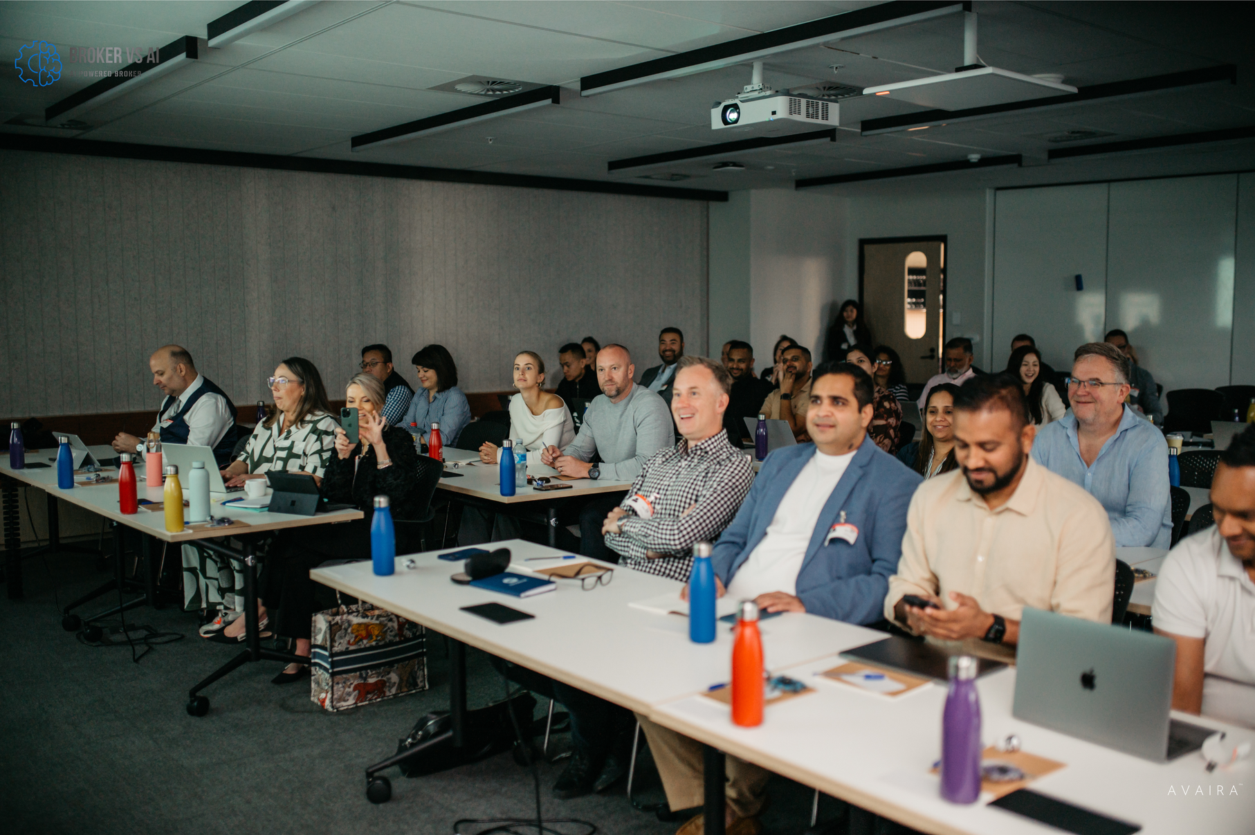 Attendees participating in interactive AI learning session